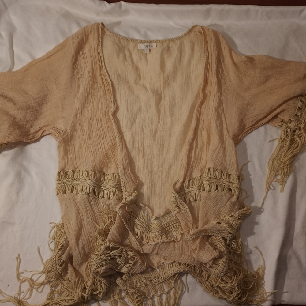 Light tan kimono with fringe